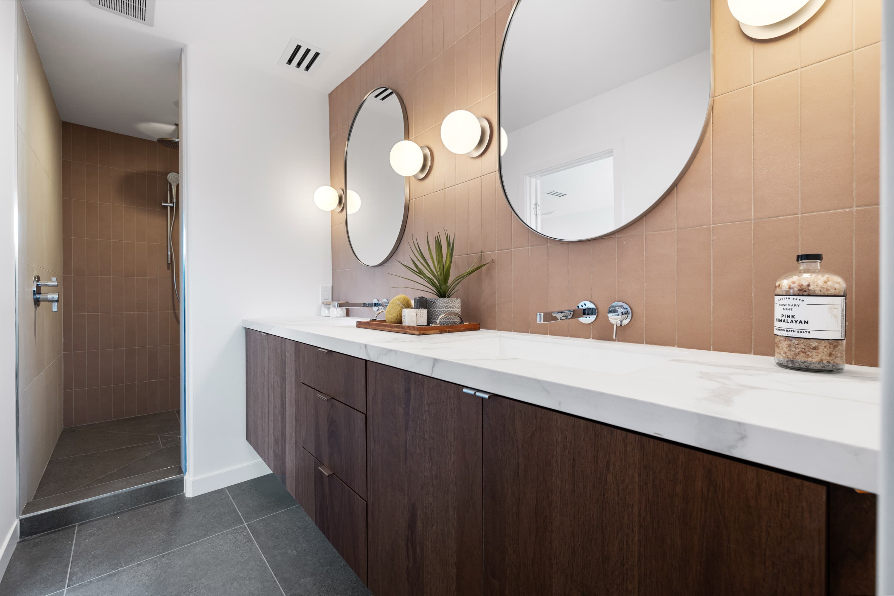 Bathroom with double round mirrors