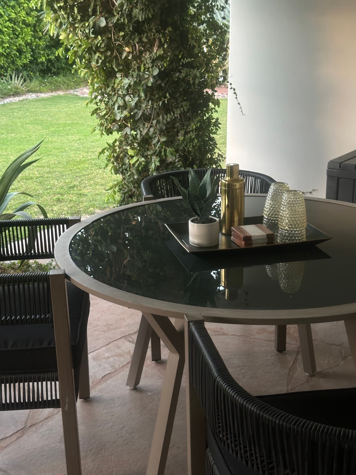 Veranda table, lawn beyond